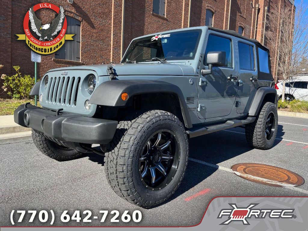 Used 2014 Jeep Wrangler Unlimited Sahara with VIN 1C4BJWEG4EL138581 for sale in Roswell, GA