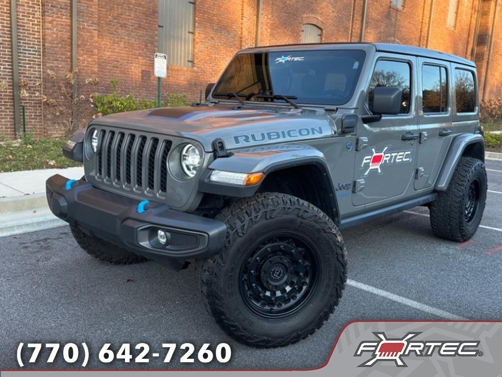 Used 2022 Jeep Wrangler Unlimited Rubicon 4XE with VIN 1C4JJXR67NW148071 for sale in Roswell, GA