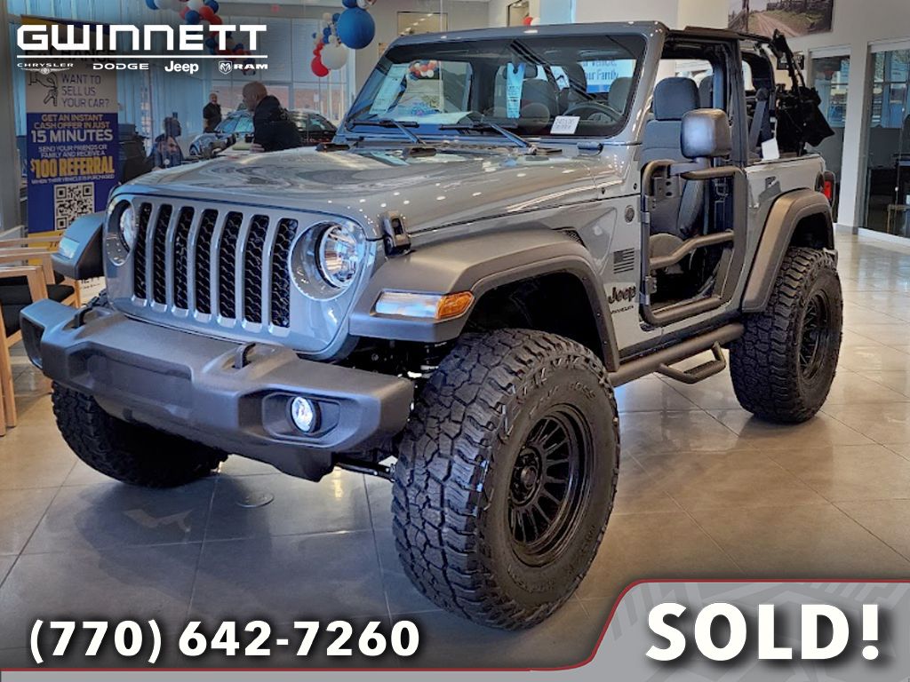 Used 2024 Jeep Wrangler 2-Door Sport with VIN 1C4PJXAN7RW124047 for sale in Roswell, GA