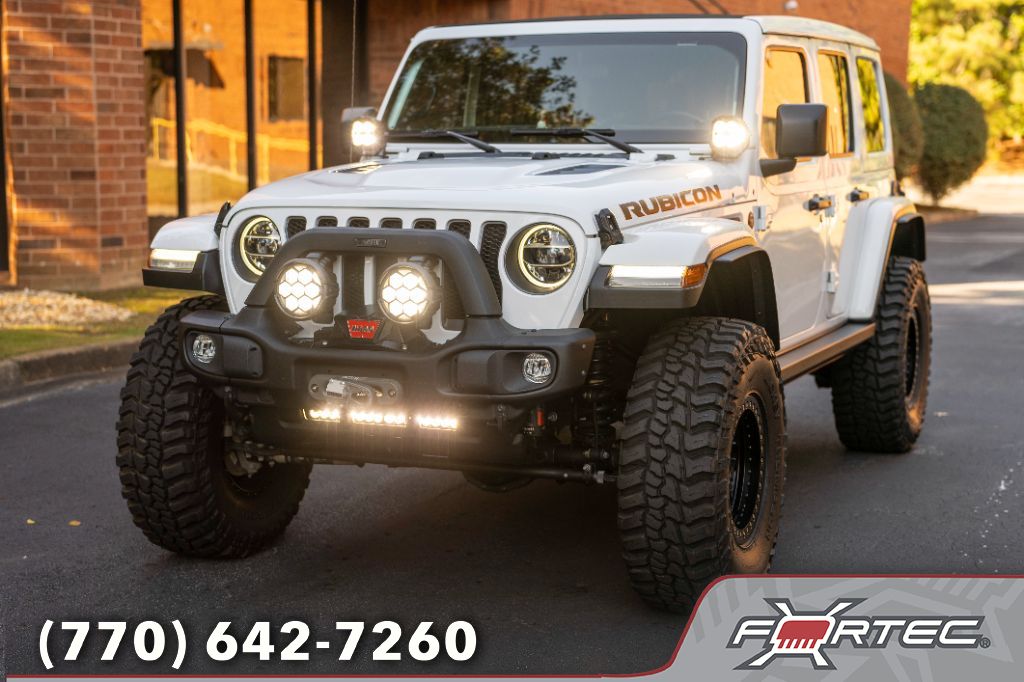 Used 2021 Jeep Wrangler Unlimited Rubicon with VIN 1C4JJXFM7MW832555 for sale in Roswell, GA